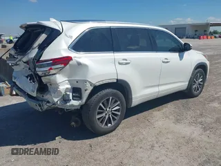 2018 Toyota Highlander SE with VIN 5TDKZRFH8JS548391, listed as a IAAI auction lot 42227742 with 79,782 mi miles and . Bid and sale history available at DreamBid. Image 4.