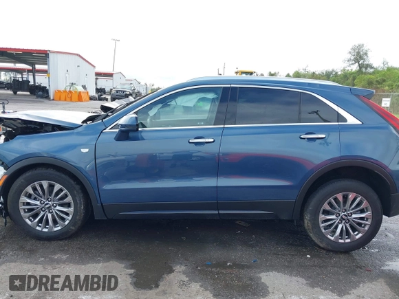 2024 Cadillac XT4 AWD Premium Luxury with VIN 1GYFZDR49RF209769, listed as a IAAI auction lot 40750875 with 1,221 mi miles and . Bid and sale history available at DreamBid. Image 13.