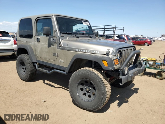 2004 Jeep Wrangler Rubicon with VIN 1J4FA69S64P751349, listed as a Copart auction lot 69642624 with 160,589 mi miles and Salvage Title. Bid and sale history available at carsss.com. Image 4.