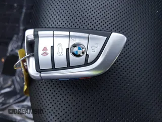 2022 BMW 8 Series M850i with VIN WBAGV8C09NCH15245, listed as a IAAI auction lot 42053154 with 26,384 mi miles and . Bid and sale history available at DreamBid. Image 11.