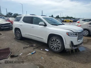 2022 GMC Acadia Denali with VIN 1GKKNPLS9NZ154553, listed as a Copart auction lot 69231444 with 105,997 mi miles and Salvage Title. Bid and sale history available at carsss.com. Image 4.