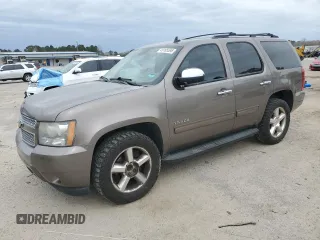 2011 Chevrolet Tahoe LS with VIN 1GNSCAE09BR138852, listed as a Copart auction lot 49165595 with 207,548 mi miles and Salvage title. Bid and sale history available at DreamBid. Image 1.