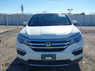 2018 Honda Pilot Touring z VIN 5FNYF6H98JB032821, wystawiony jako IAAI lot #41012077 z przebiegiem 110 321 mil mil oraz . Historia ofert i sprzedaży dostępna na DreamBid. Obrazek 12.