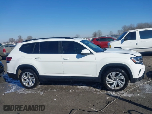 2021 Volkswagen Atlas SE z VIN 1V2WR2CA4MC514968, wystawiony jako IAAI lot #41414547 z przebiegiem 133 946 mil mil oraz . Historia ofert i sprzedaży dostępna na DreamBid. Obrazek 13.