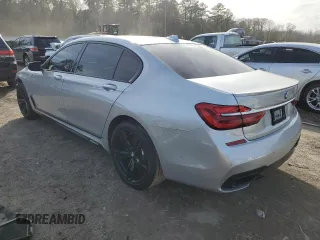 2017 BMW 7 Series 740i with VIN WBA7E2C59HG739984, listed as a Copart auction lot 37475514 with 54,841 mi miles. Bid and sale history available at carsss.com. Image 2.