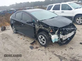 2015 Toyota Prius Four with VIN JTDKN3DU1F1996520, listed as a IAAI auction lot 41564249 with 194,433 mi miles and . Bid and sale history available at DreamBid. Image 1.