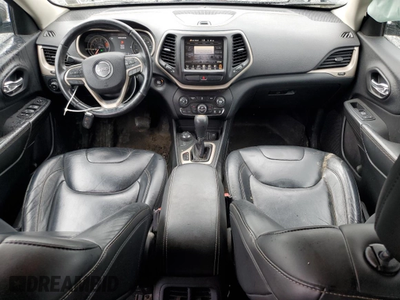 2016 Jeep Cherokee Limited with VIN 1C4PJMDBXGW261559, listed as a Copart auction lot 60042415 with 94,637 mi miles and Salvage title. Bid and sale history available at DreamBid. Image 8.