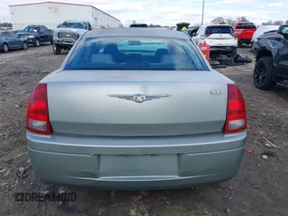 2005 Chrysler 300 with VIN 2C3JA43R05H137403, listed as a IAAI auction lot 41399519 with 135,044 mi miles. Bid and sale history available at carsss.com. Image 16.