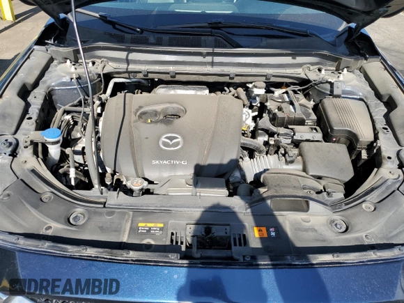 2021 Mazda CX-5 Grand Touring with VIN JM3KFBDM3M1344784, listed as a Copart auction lot 58051445 with 69,593 mi miles and Salvage title. Bid and sale history available at DreamBid. Image 12.