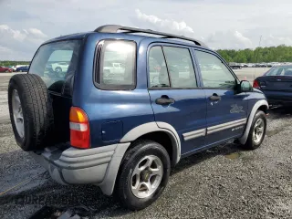 2002 Chevrolet Tracker ZR2 z VIN 2CNBJ734426936514, wystawiony jako Copart lot #54051825 z przebiegiem 229 668 mil mil oraz Szkoda całkowita • Salvage title. Historia ofert i sprzedaży dostępna na DreamBid. Obrazek 3.