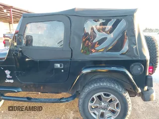 1997 Jeep Wrangler SE with VIN 1J4FY29P0VP415195, listed as a IAAI auction lot 41221078 with 137,046 mi miles. Bid and sale history available at carsss.com. Image 16.