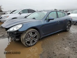 2014 Porsche Panamera с VIN WP0AA2A79EL009679, выставлен на аукционе Copart как лот 85499224 с пробегом 80 908 миль миль и Списание • Salvage title. История ставок и продаж доступна на DreamBid. Изображение 1.