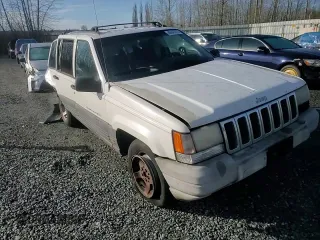 1996 Jeep Grand Cherokee Laredo with VIN 1J4EX58S3TC110154, listed as a Copart auction lot 46947805 with 268,507 mi miles and Salvage Title. Bid and sale history available at carsss.com. Image 12.