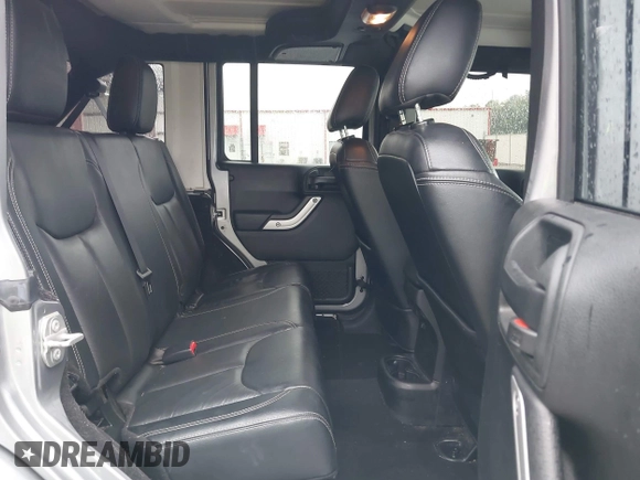 2017 Jeep Wrangler Unlimited Sahara with VIN 1C4BJWEG8HL681775, listed as a IAAI auction lot 42424924 with 87,068 mi miles and . Bid and sale history available at DreamBid. Image 8.