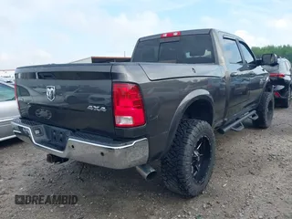 2017 Ram 2500 SLT with VIN 3C6UR5DL9HG561899, listed as a IAAI auction lot 42071797 with 134,808 mi miles and . Bid and sale history available at DreamBid. Image 4.