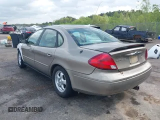 2003 Ford Taurus SE Standard with VIN 1FAFP53U63G125751, listed as a IAAI auction lot 41933803 with 196,710 mi miles. Bid and sale history available at carsss.com. Image 3.