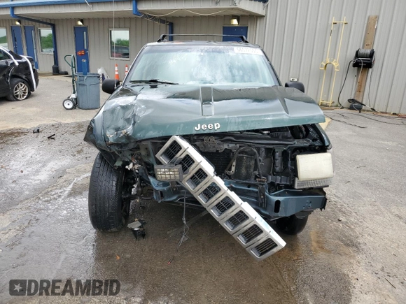 1995 Jeep Grand Cherokee Laredo with VIN 1J4FX58S8SC773884, listed as a Copart auction lot 56572555 with 424,126 mi miles and Salvage title. Bid and sale history available at DreamBid. Image 5.