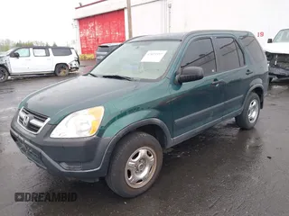 2004 Honda CR-V LX with VIN JHLRD78404C028934, listed as a IAAI auction lot 42023397 with 216,304 mi miles and . Bid and sale history available at carsss.com. Image 2.