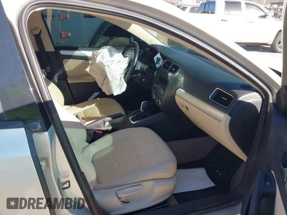 2012 Volkswagen Jetta TDI w/Premium with VIN 3VWLL7AJ0CM070228, listed as a IAAI auction lot 41709683 with Not provided miles and . Bid and sale history available at DreamBid. Image 5.