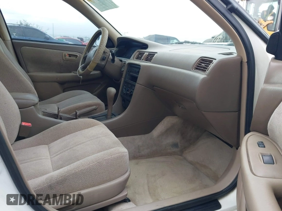 2001 Toyota Camry CE with VIN JT2BG22K110603452, listed as a IAAI auction lot 41731258 with 117,142 mi miles. Bid and sale history available at carsss.com. Image 5.