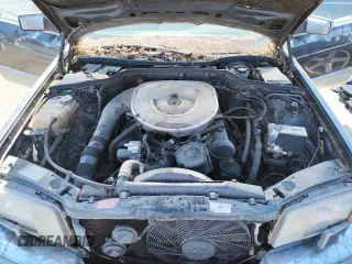 1986 Mercedes-Benz 420 with VIN WDBCA35DXGA210633, listed as a Copart auction lot 69728644 with 177,870 mi miles and Salvage Title. Bid and sale history available at carsss.com. Image 11.