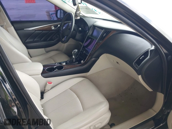 2015 Infiniti Q50 Premium with VIN JN1BV7AR1FM390739, listed as a IAAI auction lot 41865581 with 172,326 mi miles and . Bid and sale history available at DreamBid. Image 5.