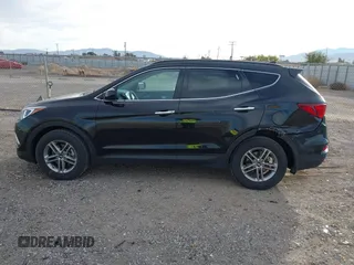 2017 Hyundai Santa Fe 2.4L z VIN 5XYZU3LB5HG425830, wystawiony jako IAAI lot #41428863 z przebiegiem 76 366 mil mil oraz . Historia ofert i sprzedaży dostępna na DreamBid. Obrazek 14.