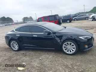 2017 Tesla Model S 60 with VIN 5YJSA1E1XHF232745, listed as a IAAI auction lot 41986834 with 89,581 mi miles and . Bid and sale history available at DreamBid. Image 13.