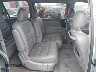 2004 Honda Odyssey EX-L with VIN 5FNRL18934B016420, listed as a IAAI auction lot 41473237 with 188,659 mi miles and . Bid and sale history available at DreamBid. Image 8.