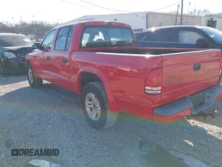 2003 Dodge Dakota Sport with VIN 1D7HL38N73S299948, listed as a IAAI auction lot 41392261 with 271,377 mi miles. Bid and sale history available at carsss.com. Image 3.