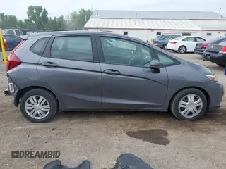 2015 Honda Fit LX with VIN 3HGGK5H58FM722880, listed as a IAAI auction lot 42276261 with 104,886 mi miles and . Bid and sale history available at DreamBid. Image 13.