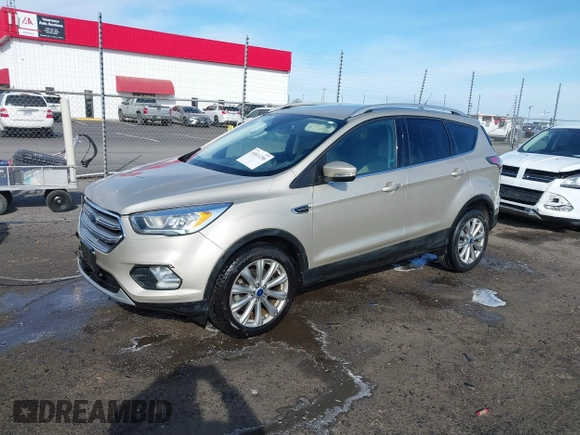 2017 Ford Escape Titanium with VIN 1FMCU0JD3HUB19602, listed as a IAAI auction lot 41816296 with 70,311 mi miles. Bid and sale history available at carsss.com. Image 19.