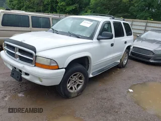 2003 Dodge Durango SLT z VIN 1D4HS48N63F597227, wystawiony jako IAAI lot #42376919 z przebiegiem 291 371 mil mil oraz . Historia ofert i sprzedaży dostępna na DreamBid. Obrazek 2.