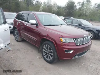 2017 Jeep Grand Cherokee Overland with VIN 1C4RJECG6HC719001, listed as a IAAI auction lot 41795517 with 103,076 mi miles. Bid and sale history available at carsss.com. Image 1.