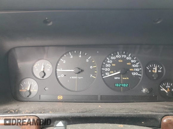 1997 Jeep Grand Cherokee Laredo with VIN 1J4GZ58Y5VC637350, listed as a Copart auction lot 77405444 with 182,482 mi miles and Clean Title. Bid and sale history available at carsss.com. Image 9.