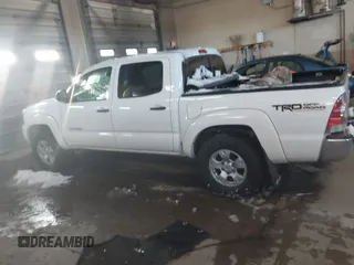 2013 Toyota Tacoma with VIN 3TMLU4EN2DM104490, listed as a IAAI auction lot 41636616 with 153,036 mi miles and . Bid and sale history available at DreamBid. Image 14.