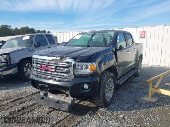 2015 GMC Canyon 2WD SLT with VIN 1GTG5CE38F1247533, listed as a IAAI auction lot 41369019 with 94,443 mi miles. Bid and sale history available at carsss.com. Image 2.