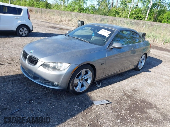 2007 BMW 3 Series 335i with VIN WBAWL73587PX49709, listed as a IAAI auction lot 41989465 with 147,255 mi miles. Bid and sale history available at carsss.com. Image 2.
