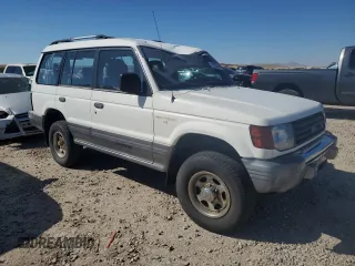 1995 Mitsubishi Montero z VIN JA4MR41H3SJ004800, wystawiony jako Copart lot #72036354 z przebiegiem 209 635 mil mil oraz Szkody całkowita. Historia ofert i sprzedaży dostępna na DreamBid. Obrazek 4.