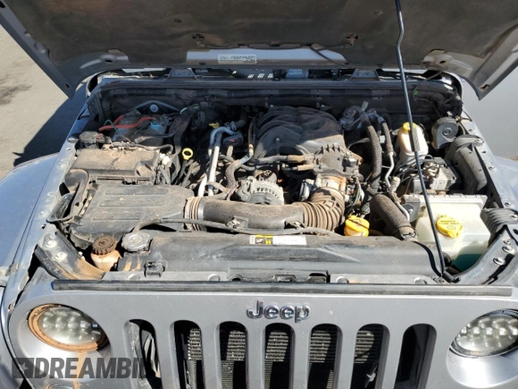 2015 Jeep Wrangler Sahara с VIN 1C4AJWBG1FL742588, выставлен на аукционе Copart как лот 72400274 с пробегом 139 520 миль миль и Списание • Salvage title. История ставок и продаж доступна на DreamBid. Изображение 11.
