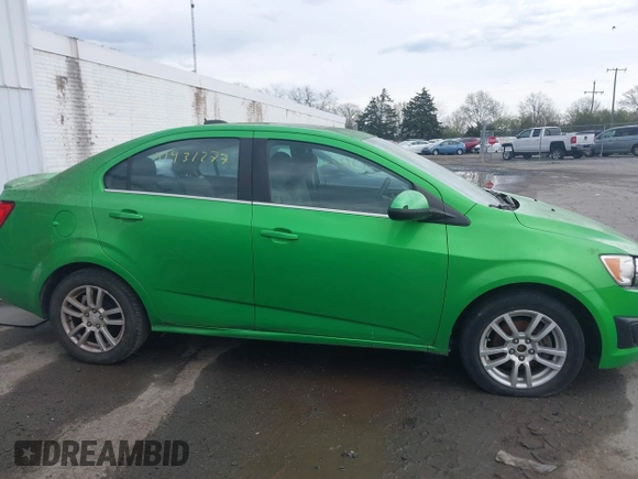 2015 Chevrolet Sonic LT with VIN 1G1JC5SH7F4152878, listed as a IAAI auction lot 41931277 with 180,189 mi miles and . Bid and sale history available at DreamBid. Image 13.