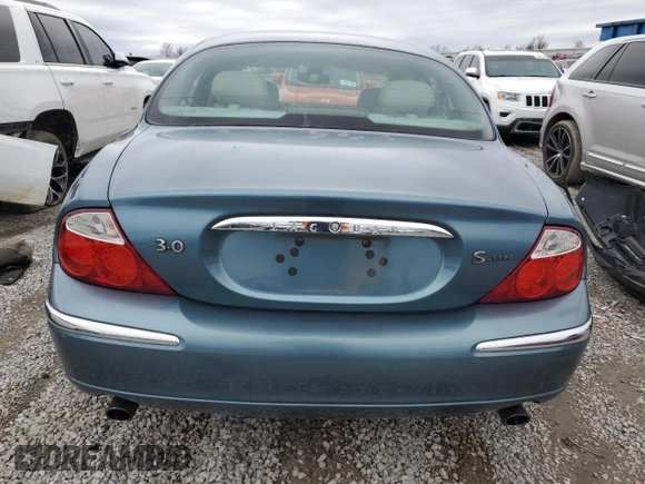 2000 Jaguar S-Type V6 z VIN SAJDA01C1YFL38878, wystawiony jako Copart lot #44323075 z przebiegiem 231 855 mil mil oraz Szkoda całkowita • Salvage title. Historia ofert i sprzedaży dostępna na DreamBid. Obrazek 6.