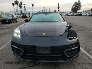 2022 Porsche Panamera z VIN WP0AJ2A79NL102055, wystawiony jako Copart lot #82739553 z przebiegiem 12 943 mil mil oraz . Historia ofert i sprzedaży dostępna na DreamBid. Obrazek 5.