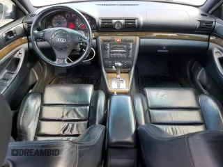 2000 Audi S4 z VIN WAUDD68D7YA179687, wystawiony jako Copart lot #77201694 z przebiegiem 165 118 mil mil oraz Szkody całkowita. Historia ofert i sprzedaży dostępna na DreamBid. Obrazek 8.
