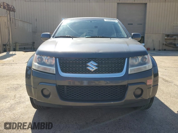 2012 Suzuki Grand Vitara Premium z VIN JS3TD0D23C4100721, wystawiony jako Copart lot #53086955 z przebiegiem 99 951 mil mil oraz Szkoda całkowita • Salvage title. Historia ofert i sprzedaży dostępna na DreamBid. Obrazek 5.