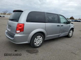 2019 Dodge Grand Caravan SE with VIN 2C4RDGBGXKR642247, listed as a Copart auction lot 54124295 with 153,163 mi miles and Salvage Title. Bid and sale history available at DreamBid. Image 3.