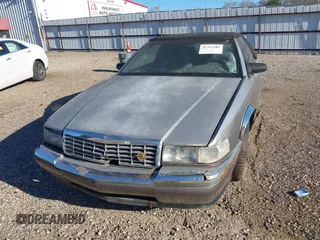 1992 Cadillac Seville z VIN 1G6EL13B2N0612154, wystawiony jako IAAI lot #41757101 z przebiegiem Nie podano mil oraz . Historia ofert i sprzedaży dostępna na DreamBid. Obrazek 13.