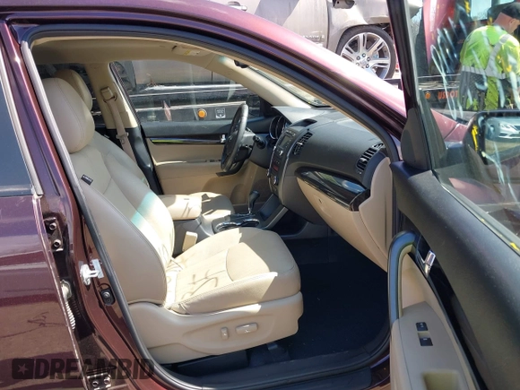 2012 Kia Sorento EX with VIN 5XYKUDA22CG293371, listed as a IAAI auction lot 41869105 with 69,842 mi miles. Bid and sale history available at carsss.com. Image 5.