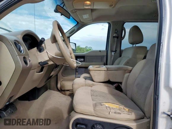 2006 Ford F-150 XLT with VIN 1FTRW12W76KD38036, listed as a Copart auction lot 63437925 with 299,214 mi miles and Salvage title. Bid and sale history available at DreamBid. Image 7.