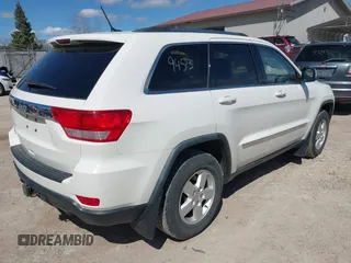 2011 Jeep Grand Cherokee Laredo with VIN 1J4RR4GG9BC556083, listed as a IAAI auction lot 42139453 with 145,623 mi miles and . Bid and sale history available at DreamBid. Image 4.